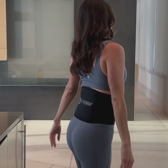 Back Ice Wrap, Back Support, Back Heating Pad, ActiveWrap in use on a beautiful model